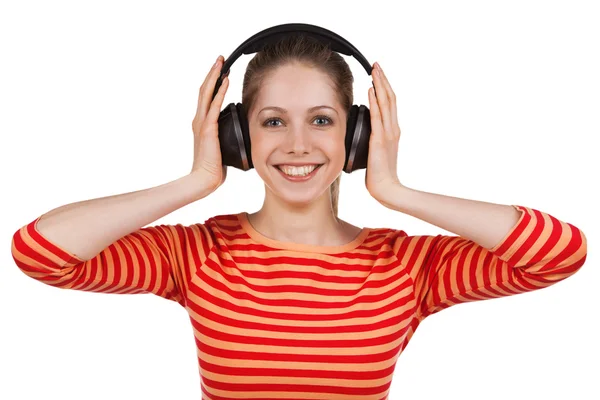 Meisje luistert naar muziek op hoofdtelefoon — Stockfoto