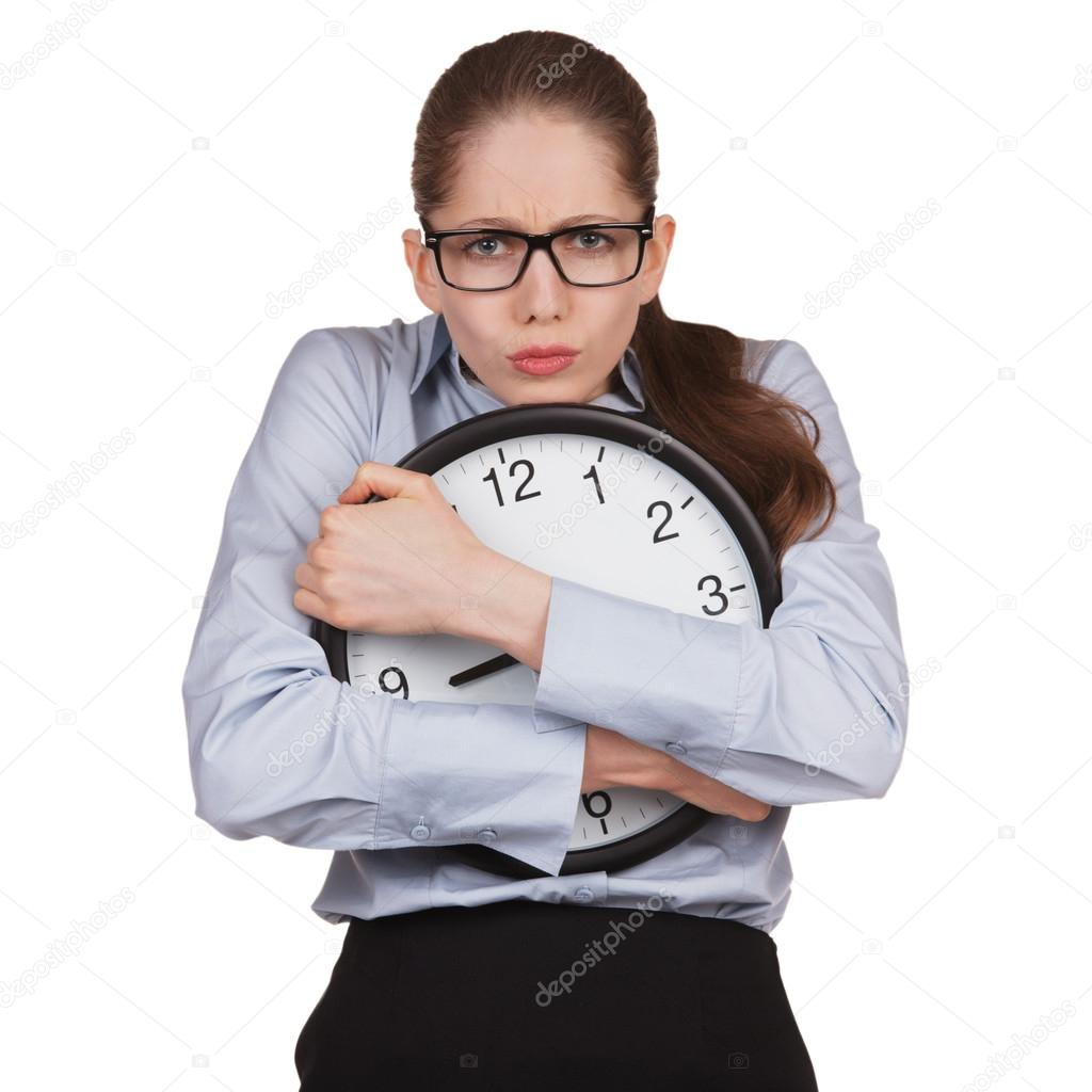 Sad woman with clock in hands