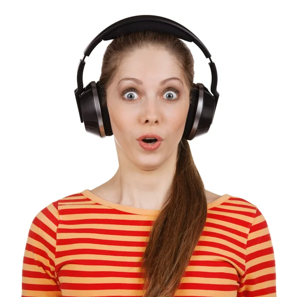 Surprised woman with headphones listening to the muse — Stock Photo, Image