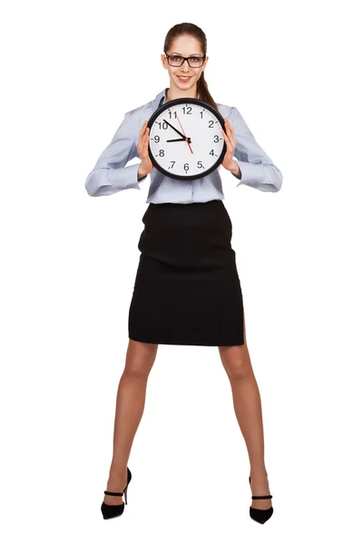 Girl with a big clock in hands Stock Picture