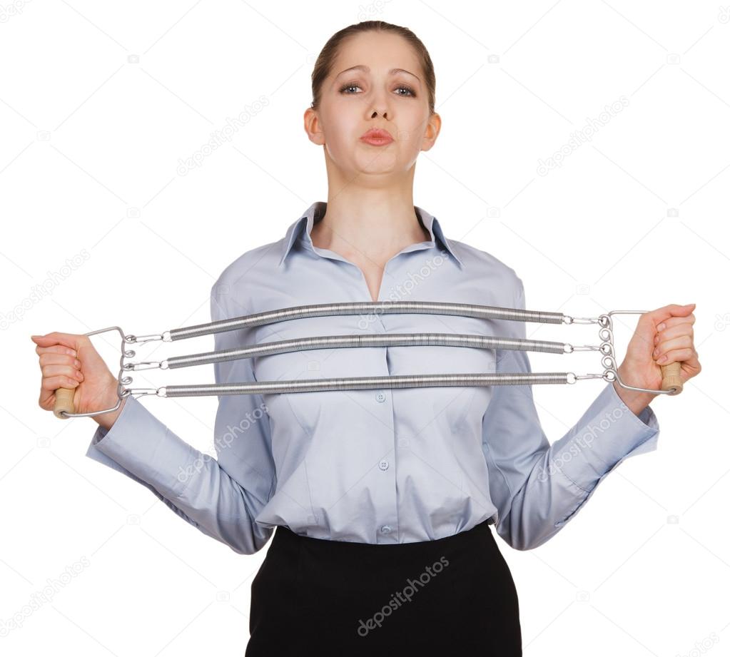 Woman trying to stretch a steel expander