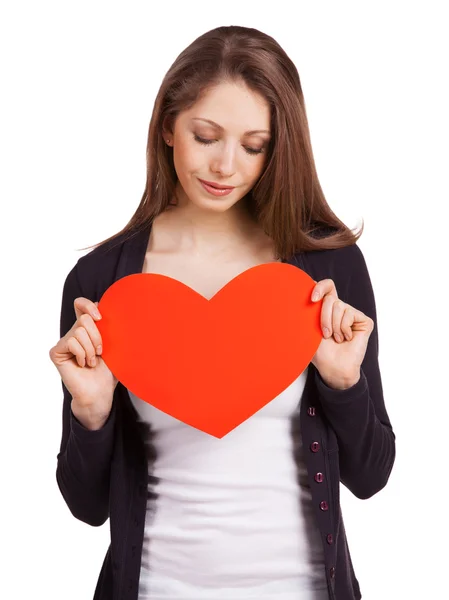 Mujer bonita sosteniendo un corazón rojo — Foto de Stock