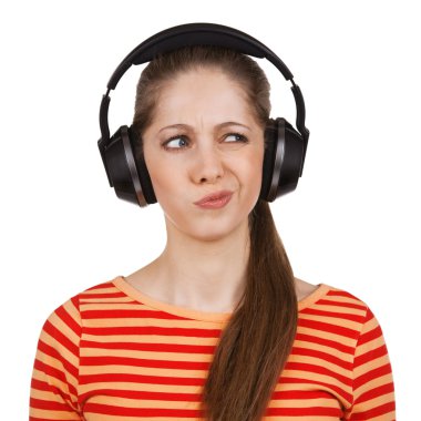 Girl with headphones expresses negative emotions clipart