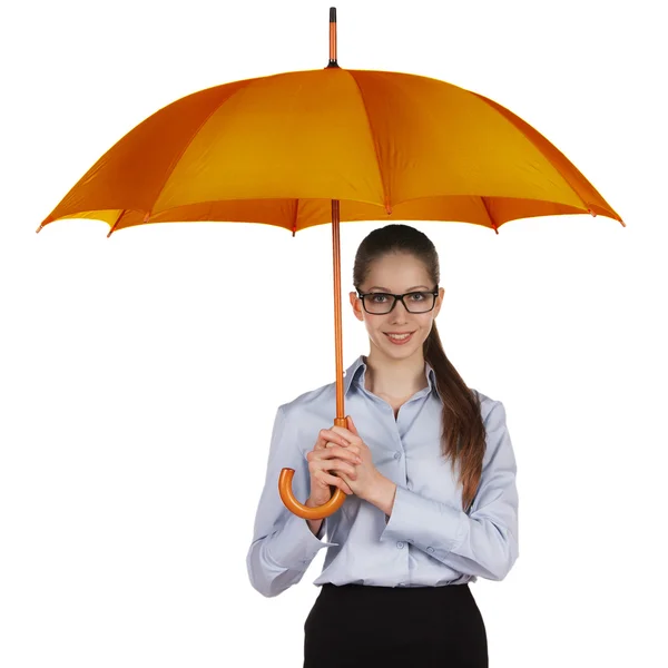 Happy woman standing under a large umbrella — Stock Photo, Image