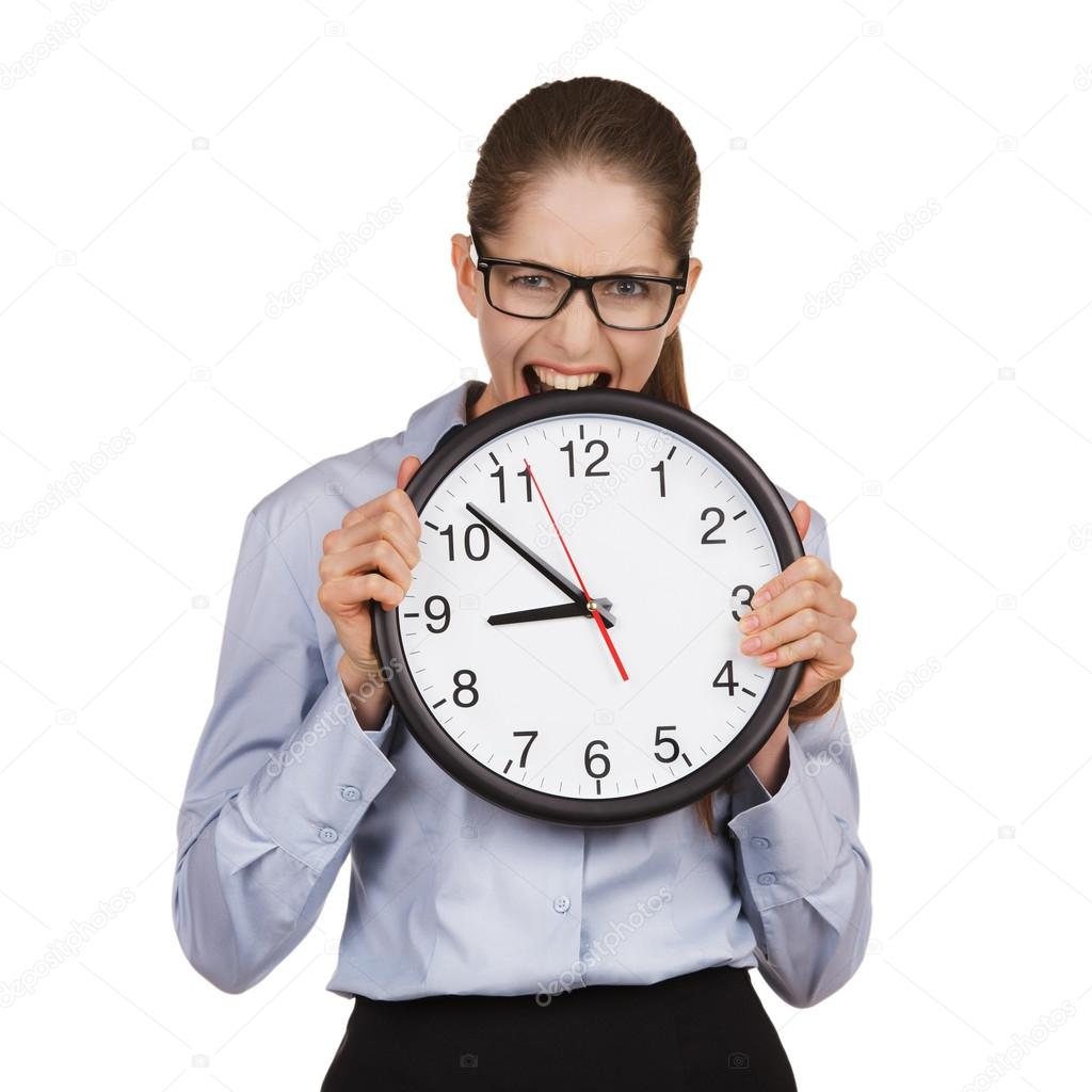 Girl in a state of stress bites the clock