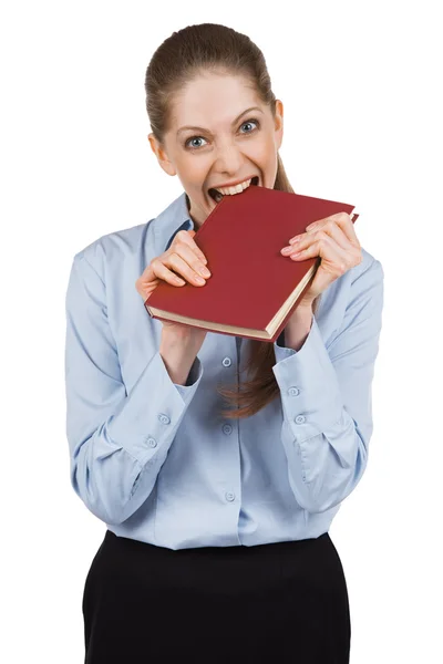 Nervous woman tries to bite a book — Stock Photo, Image