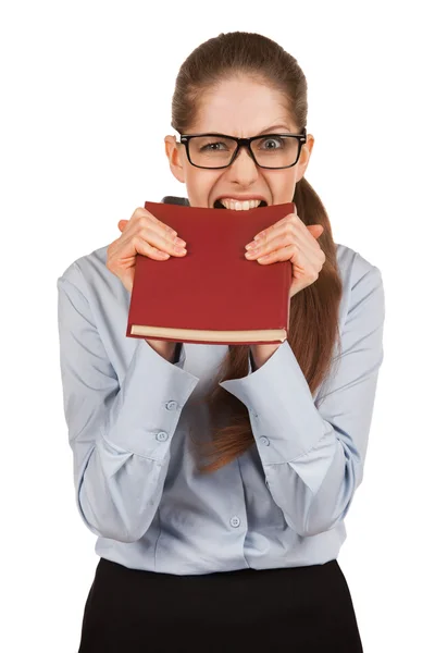 Menina mordendo dentes na capa do livro — Fotografia de Stock