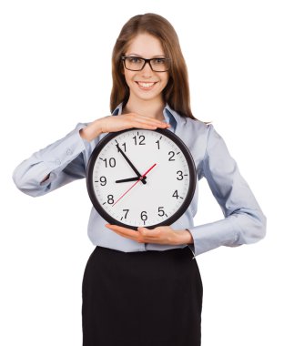Smiling young woman holding a clock clipart