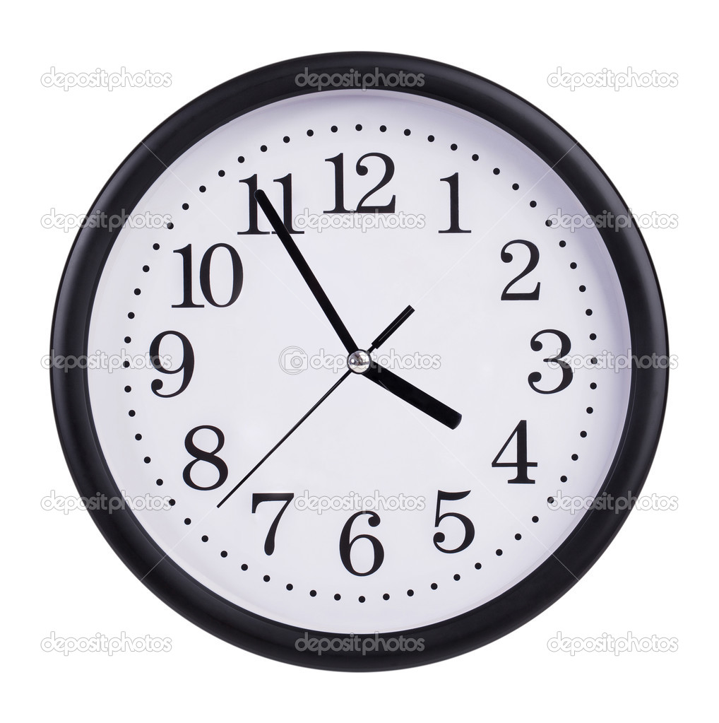 Office clock shows five minutes to four