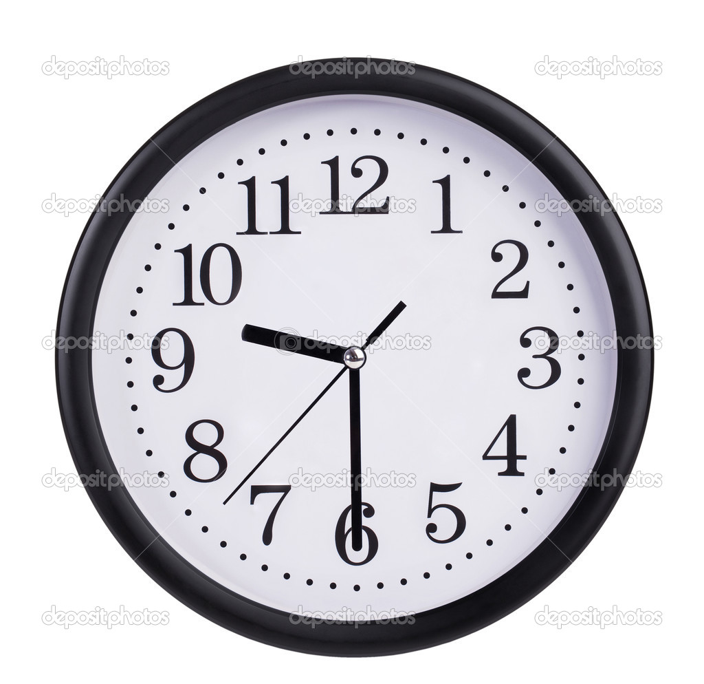 Office clock shows half past nine