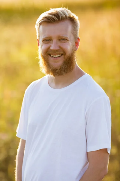 Happy young blond bearded man — Stock Photo, Image