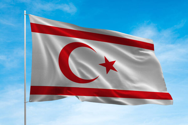 Northern cyprus flag waving in the blue sky