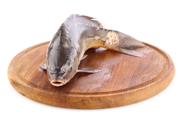 Fresh fish (carp) on wooden board fresh fish (carp) on wooden board — Stock Photo, Image