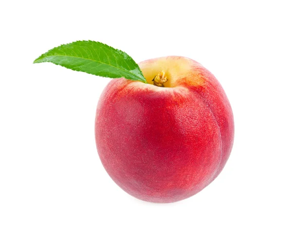 Reifer saftiger Pfirsich mit grünem Blatt — Stockfoto
