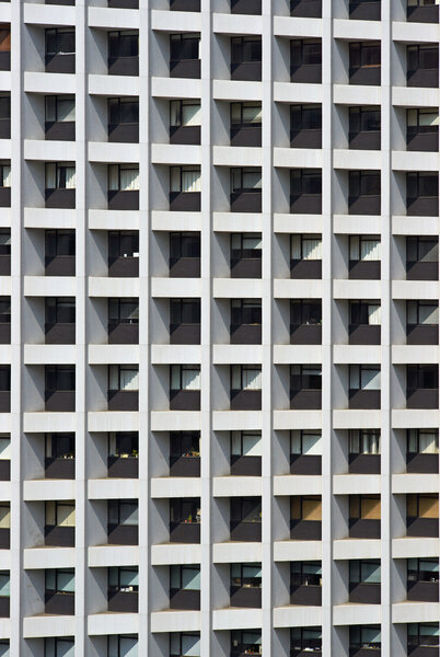 Lattice shaped windows of a modern office block in Hong Kong, China