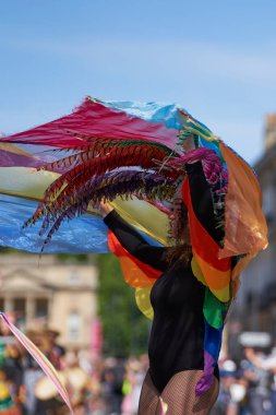 Bath, England, United Kingdom - 9 July 2022: Dancers in ornate costumes performing at the annual carnival as it progresses through the streets of the historic city of Bath in Somerset.