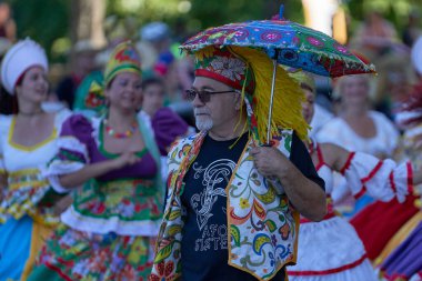 Bath, England, United Kingdom - 9 July 2022: Annual carnival returns to the streets of the historic city of Bath in Somerset.