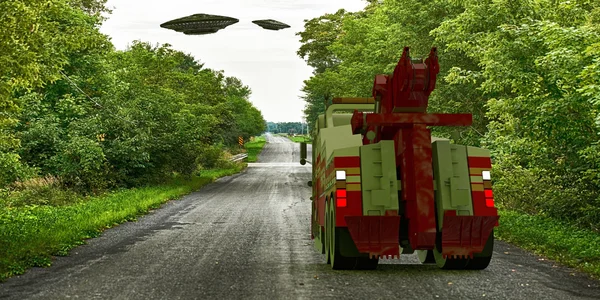 Ufo survolant une route de campagne — Photo