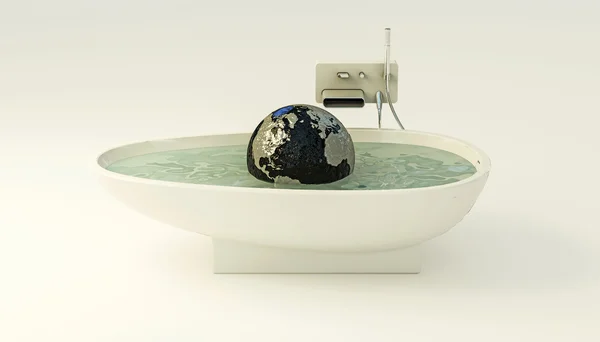 Planet earth floating on the water surface of a bathtub — Stock Photo, Image
