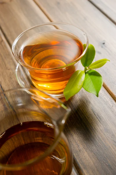 Teacup on a wooden table — Stock Photo, Image