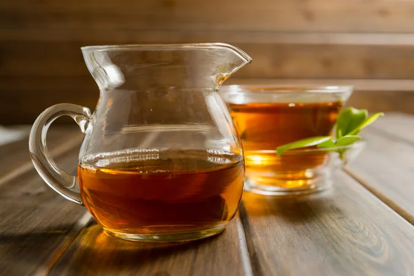 Teacup on a wooden table — Stock Photo, Image