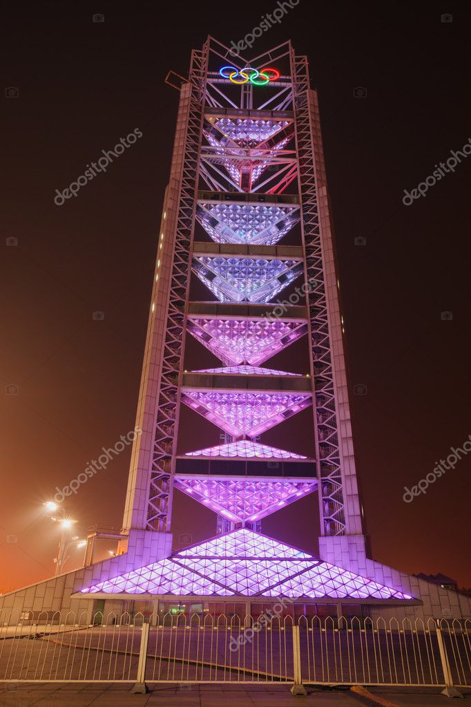 Beijing, China - June 1, 2012: Linglong Tower in Beijing Olympic Park.The 2008 Olympic Games held in Beijing,the Olympic Logo is on the top of tower,it is the landmark of Beijing.this photo was take in night time