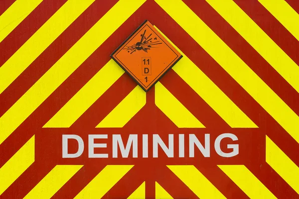 Demining sign and explosive danger sign.