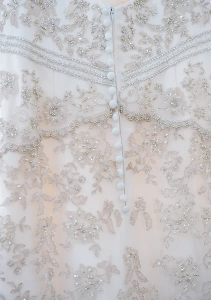 Детали платья невесты — стоковое фото