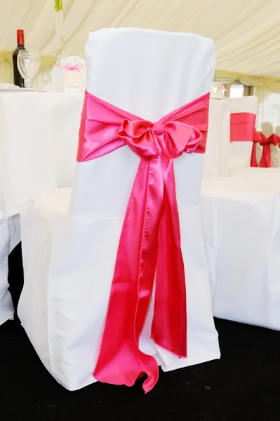 Chair cover with pink bow — Stock Photo, Image