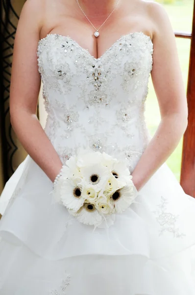 Brides flowers and dress detail — Stock Photo, Image