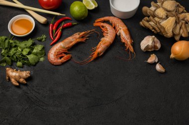 Tom yum soup ingredients with space for text