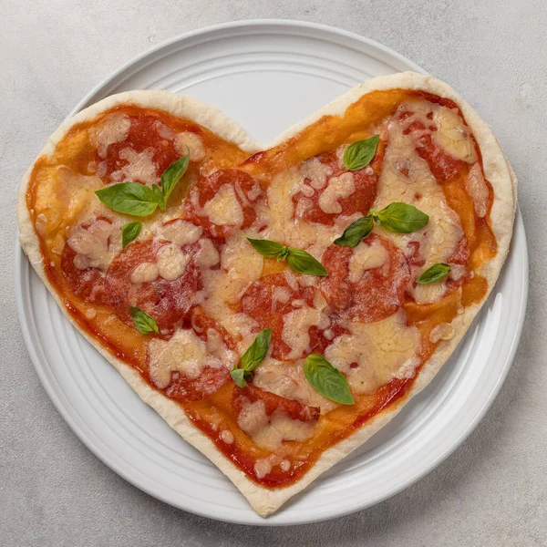 Pizza in the shape of a heart for Valentine\'s Day