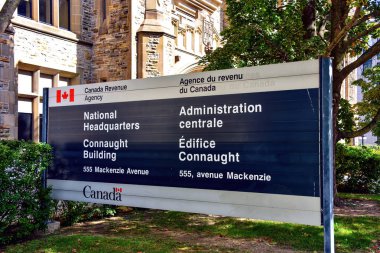 Ottawa, Canada - September 10, 2022: The Headquarters of the Canada Revenue Agency at the Connaught Building in downtown Ottawa. The CRA is the revenue service of the federal government. clipart