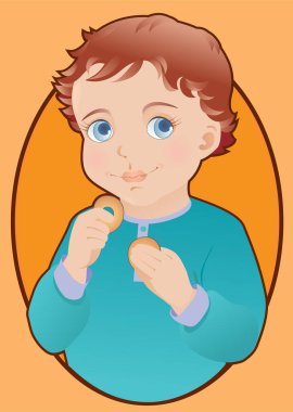 Elinde simit olan küçük bir çocuk.