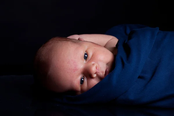 Newborn in sling — Stock Photo, Image