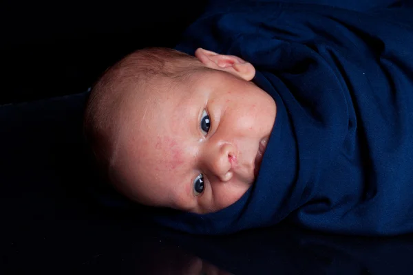 Newborn in sling — Stock Photo, Image