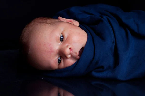 Newborn in sling — Stock Photo, Image