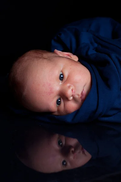 Newborn in sling — Stock Photo, Image