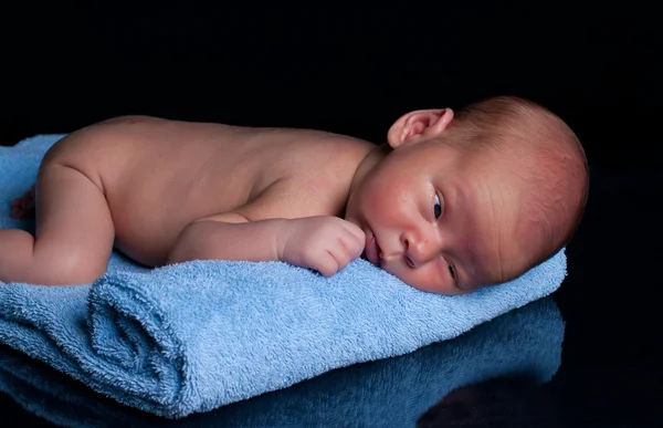 Newborn on towel — Stock Photo, Image