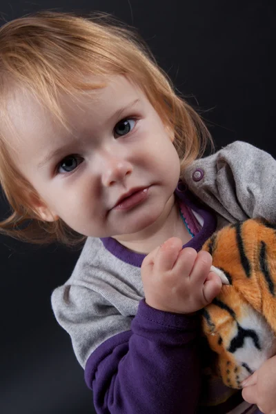 Girl with christmas toy — Stock Photo, Image