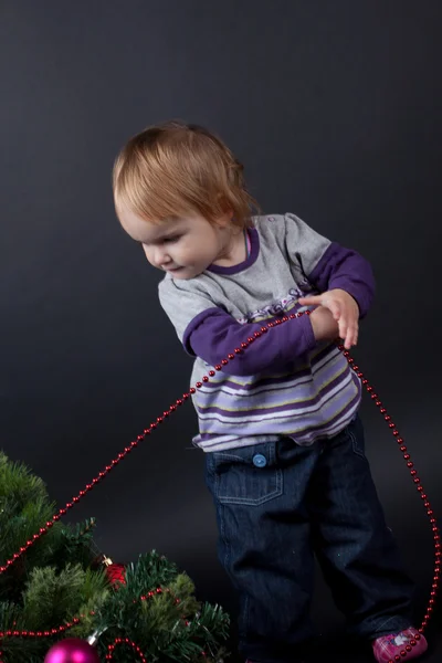 Girl with christmas toy — Stock Photo, Image