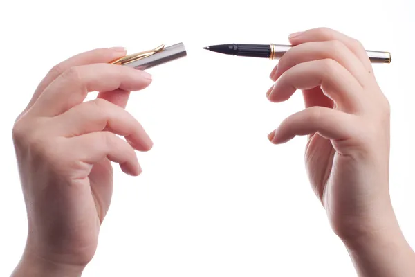 Woman holding a pen — Stock Photo, Image