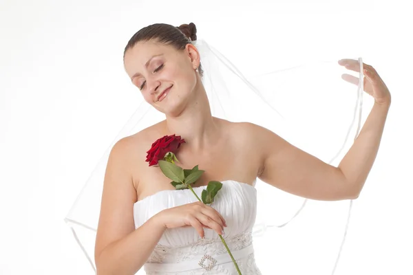Mariée en blanc avec rose rouge — Photo