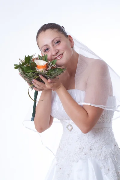 Bride holding boquet — Stock Photo, Image
