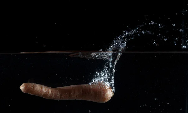 Plusk wody marchew — Zdjęcie stockowe