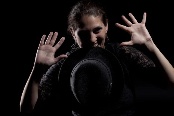 Woman with black hat — Stock Photo, Image