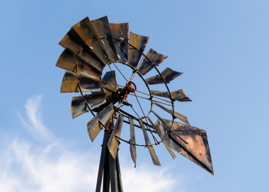 Antique Windmill with Cloudy Blue Sky