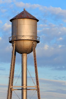 Metal Water Tower and Morning Sky clipart