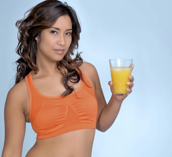 Young woman with orange juice — Stock Photo, Image