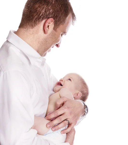 Man holding baby with smiles — Stock Photo, Image